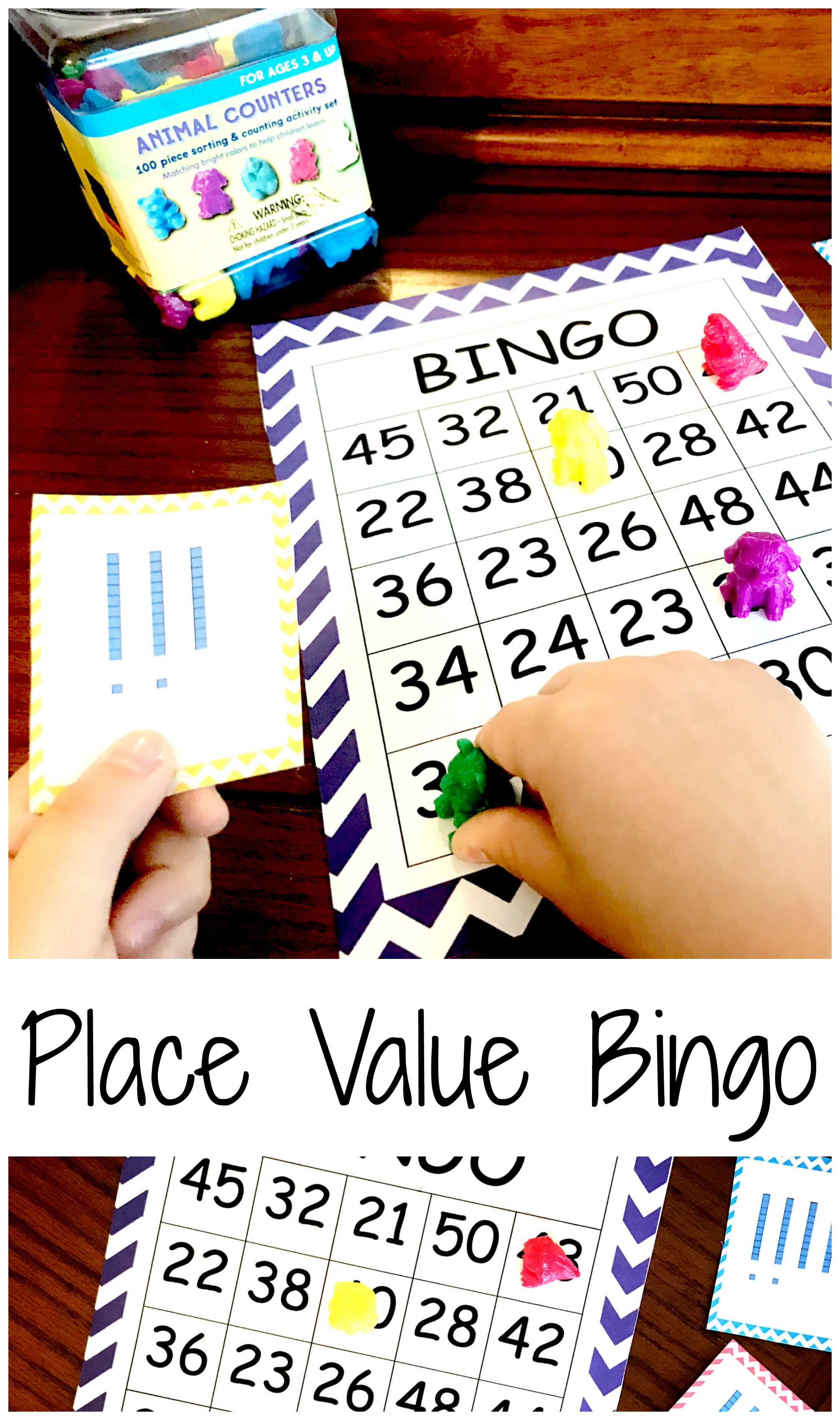 Place value bingo cards on a wooden floor.