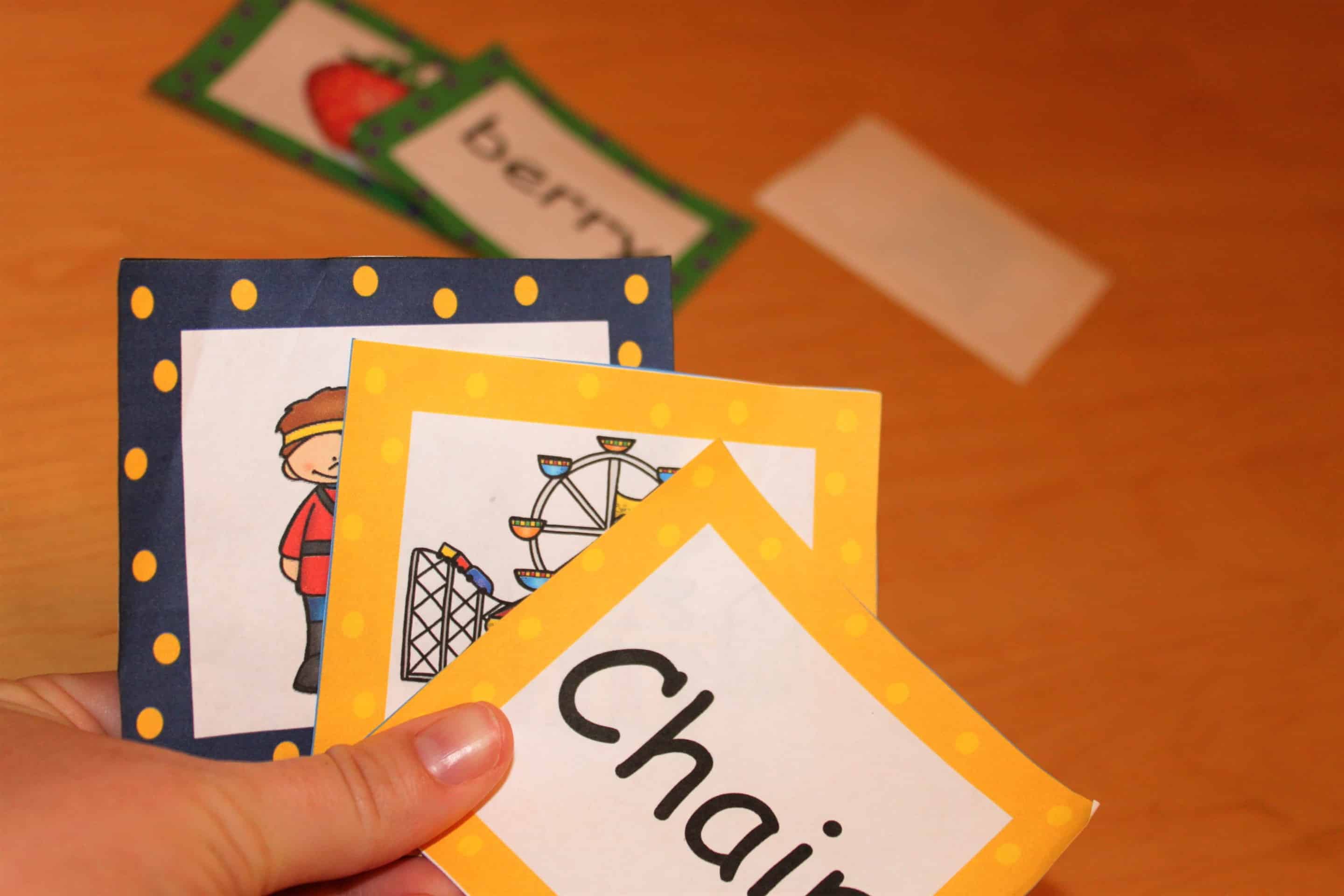 child learning air eir and err words by playing a phonics game