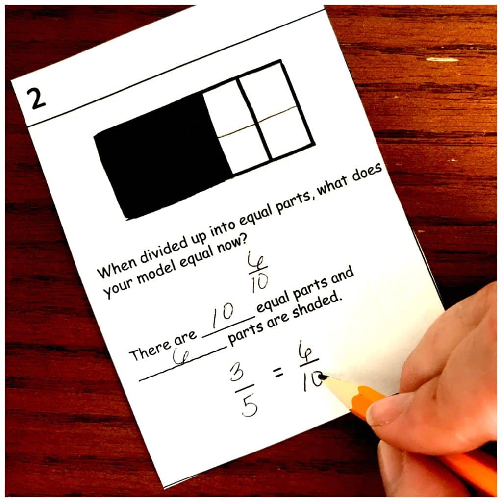 Equivalent fractions interactive notebook worksheet with part of the fraction filled out in black. 