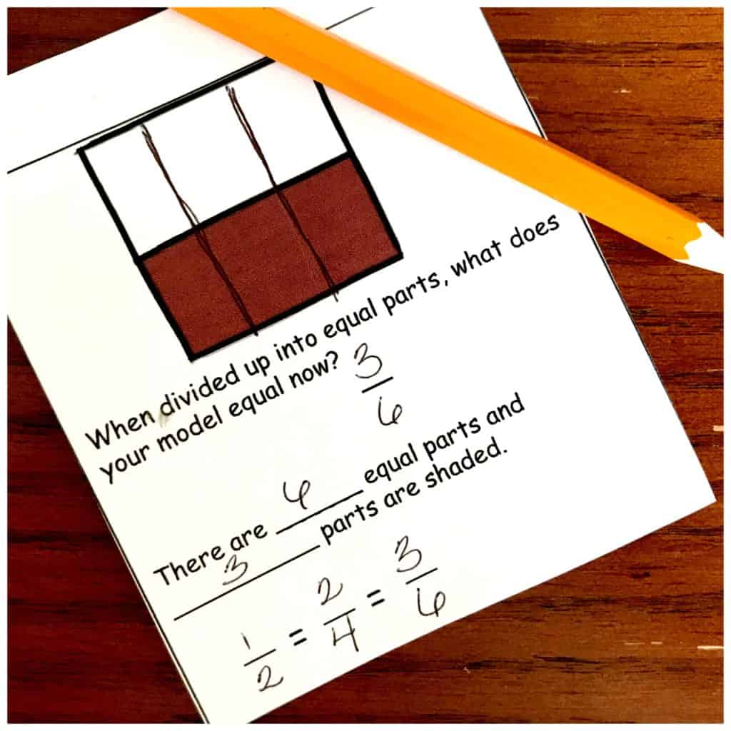 Equivalent fractions interactive notebook worksheet with part of the fraction filled out in brown with a pencil laying beside it. 