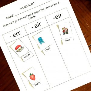 Air phonics worksheet with pictures and words on a wooden background. 