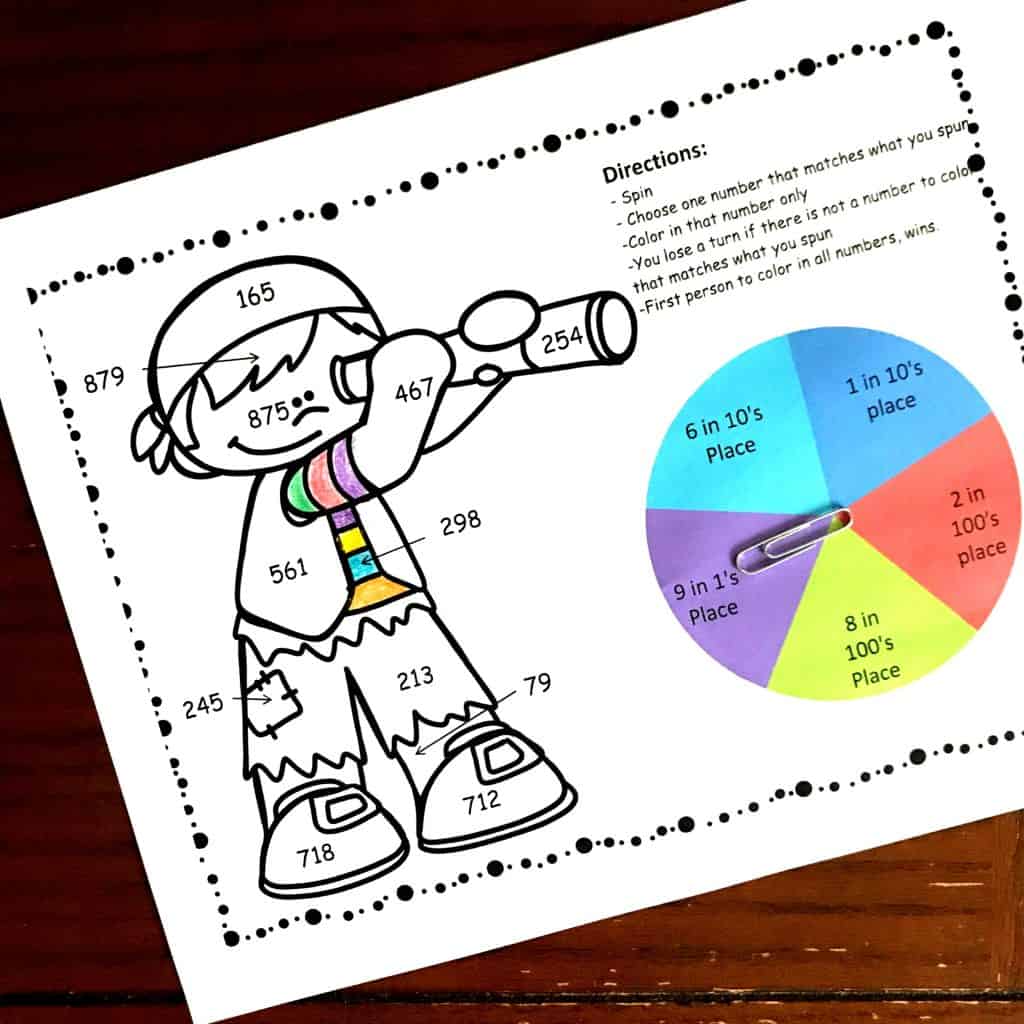 Place value color by number worksheets with a pirate that is looking through a telescope. The shirt is colored in various colors. 