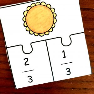 Adding fractions game with pictures of pies made into fractions. 