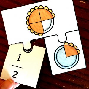 Adding fractions game with pictures of pies made into fractions. 