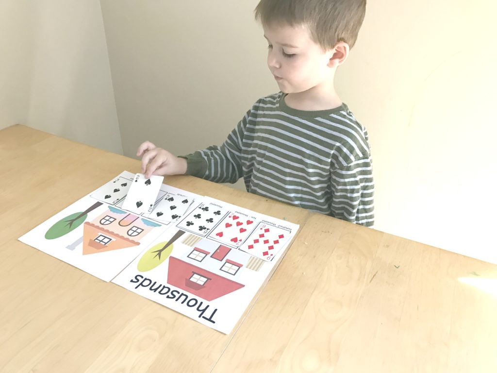 Help Your Kids Learn Large Numbers With A Place Value Game Printable