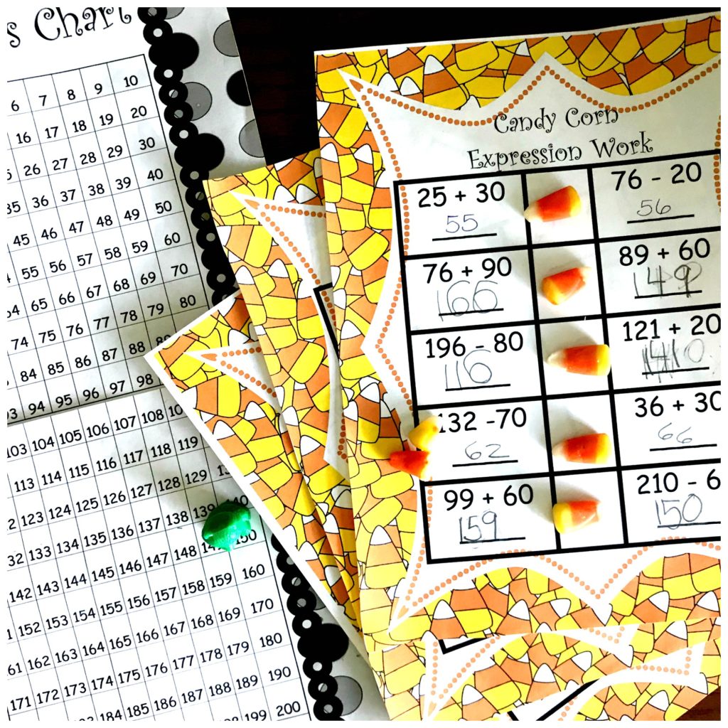 Comparing Expressions worksheets with candy corn.