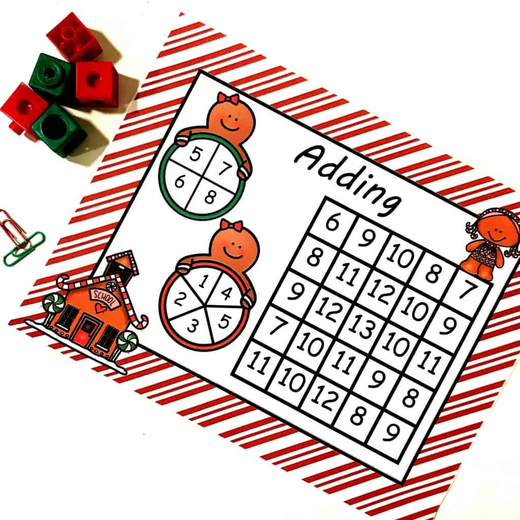 Christmas Math Facts Practice worksheet with game pieces beside it