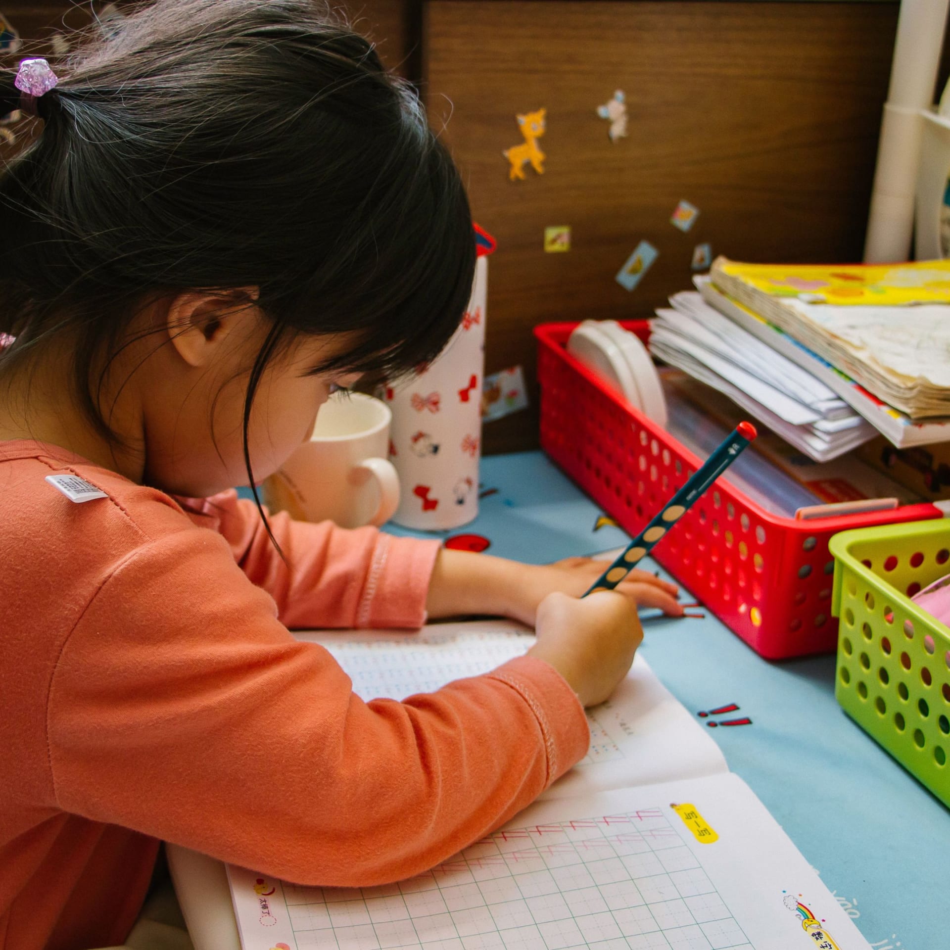 kindergarten student doing a printable worksheet