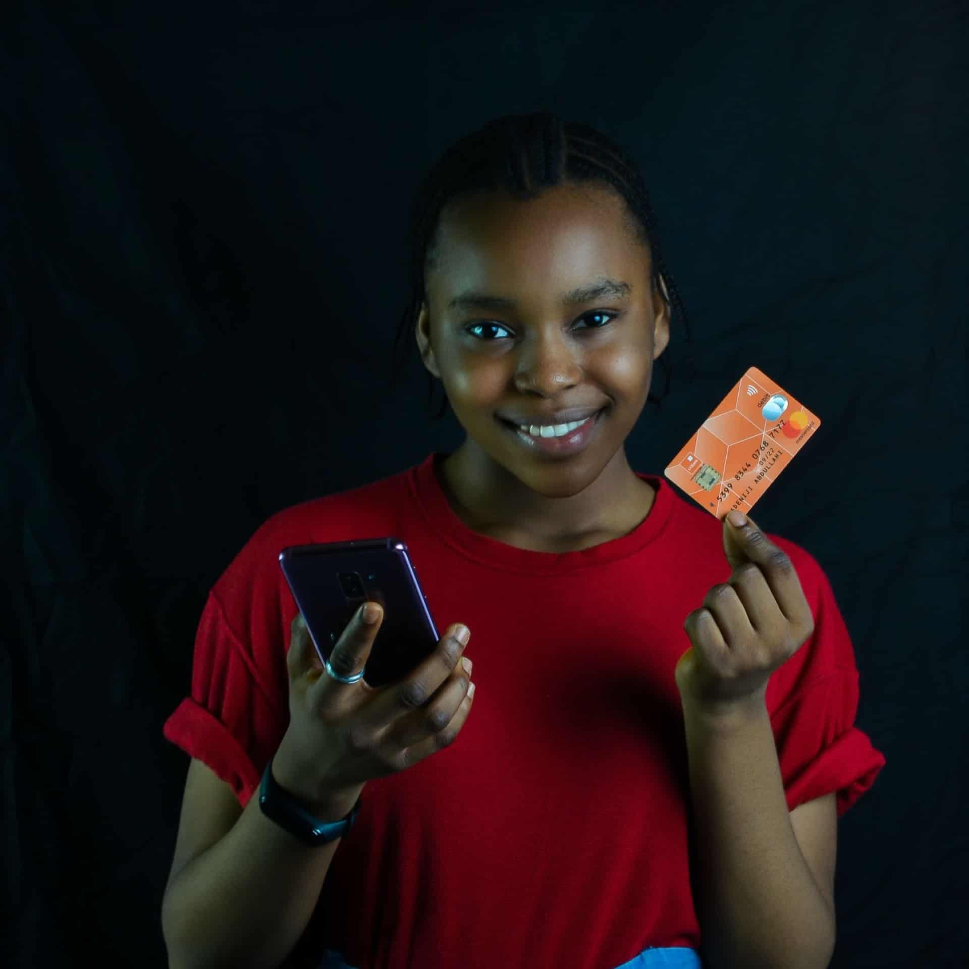young girl with a credit card
