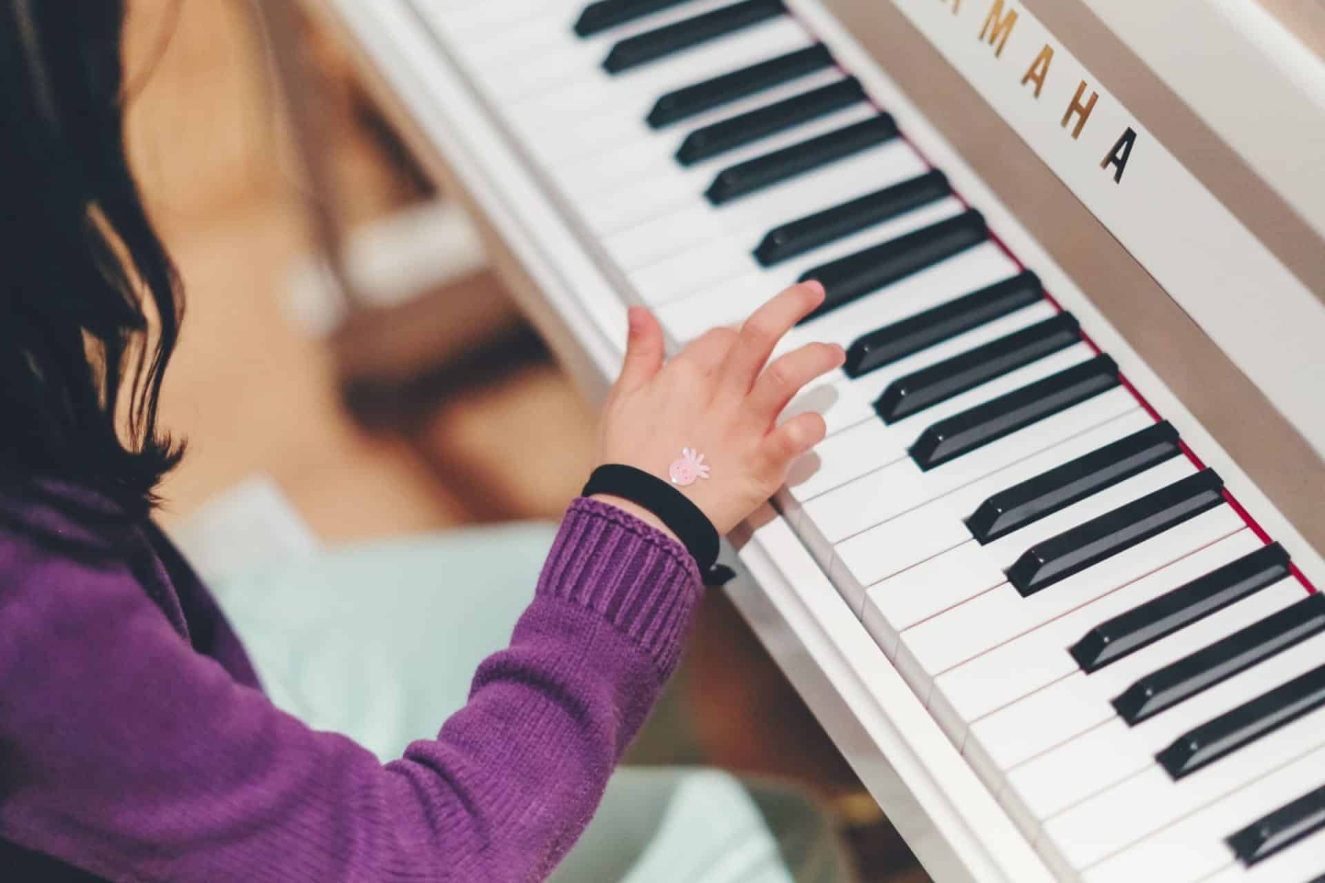 child playing piano